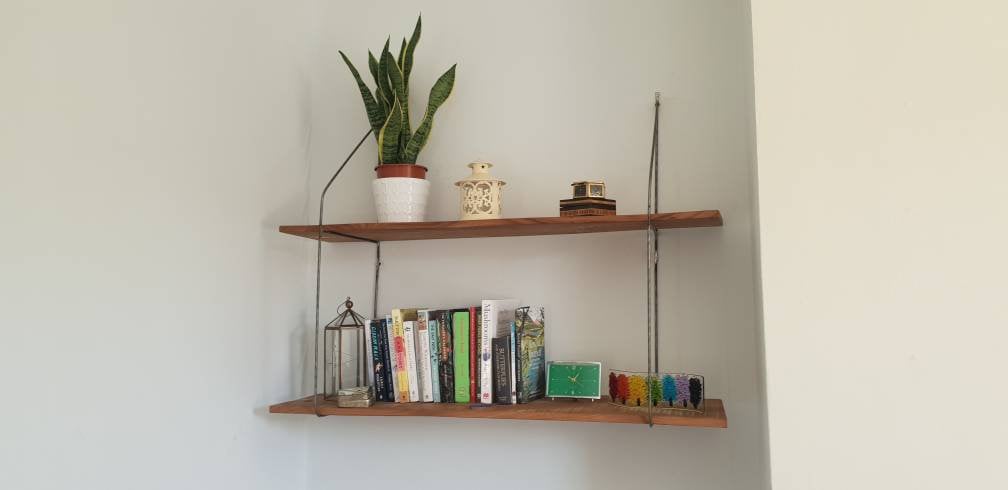 6mm thick minimalist wire brackets holding 2 sweet chestnut shelves