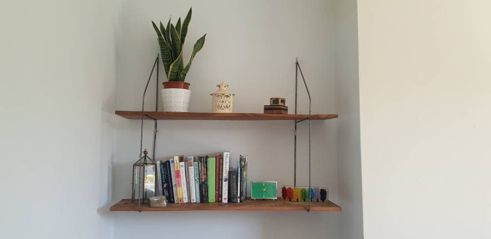 6mm thick minimalist wire brackets holding 2 sweet chestnut shelves