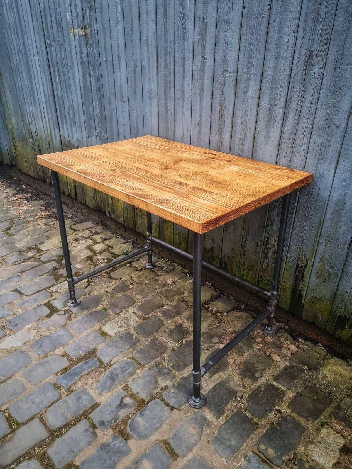 a reclaimed scaffold board and industrial gas pipe desk - 38mm scaffold board, 28mm thick gas pipe and malleable iron pipe fittings