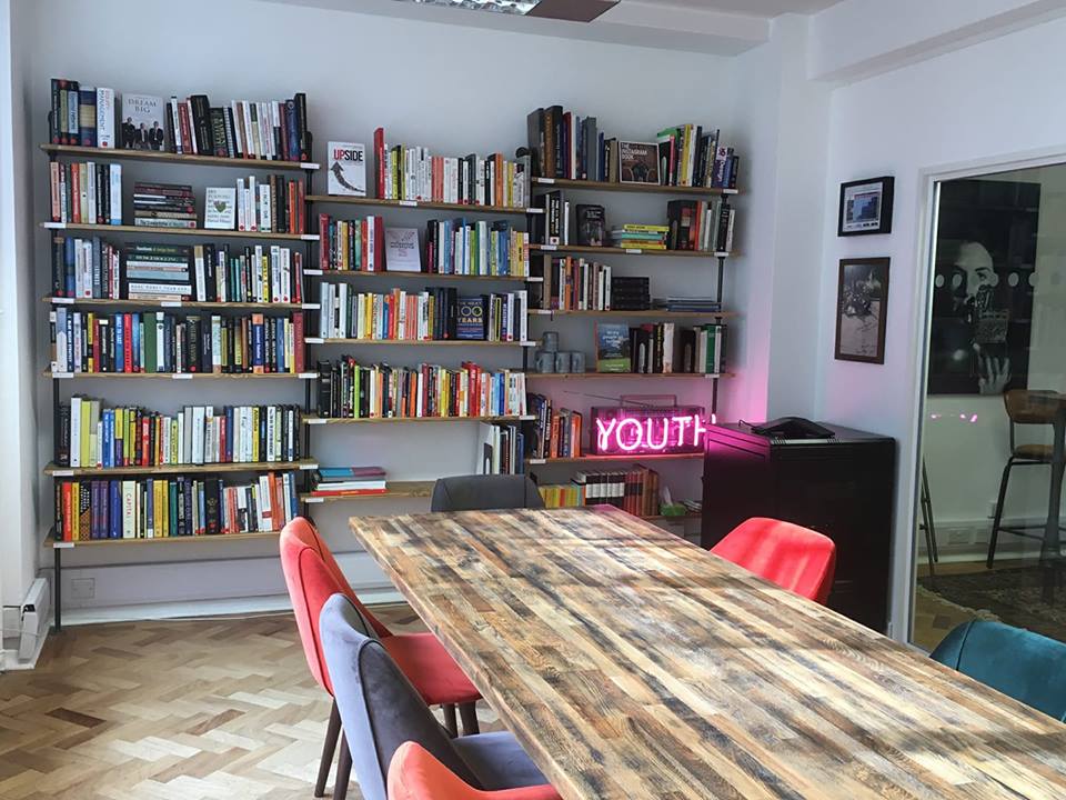 Custom bookcase shelving unit with industrial gas pipe and reclaimed wood. perfect for office or living room storage. custom bookcase. living room contemporary furntiture. 